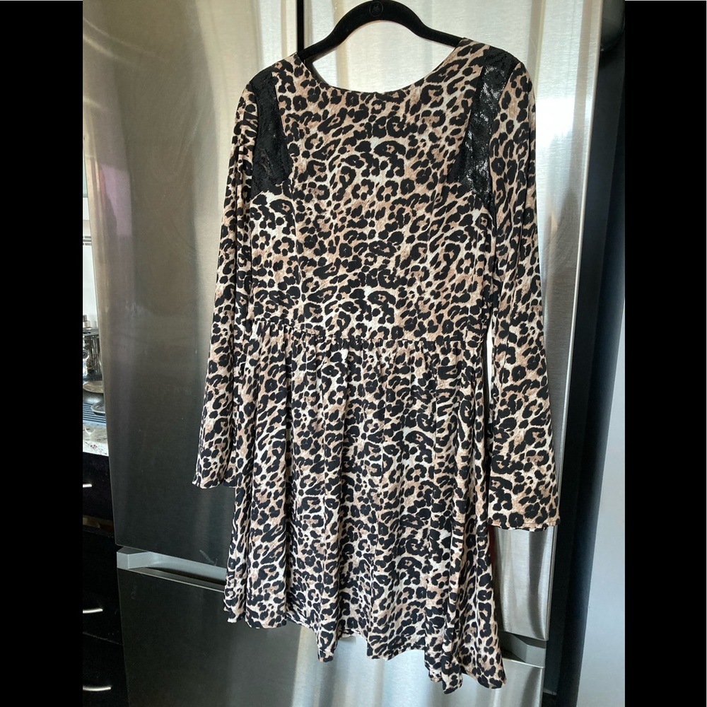 Never been worn, fun cheetah print dress!